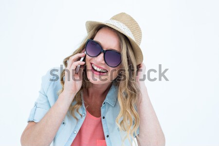 Composite image of gorgeous smiling blonde hipster with sunglass Stock photo © wavebreak_media
