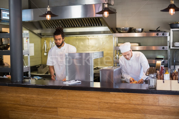 Chefs working in commercial kitchen Stock photo © wavebreak_media