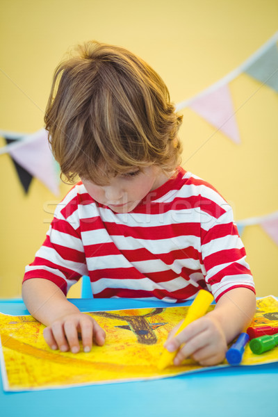 Small boy colouring in his picture Stock photo © wavebreak_media