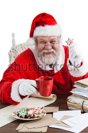 Santa Claus reading a letter Stock photo © wavebreak_media