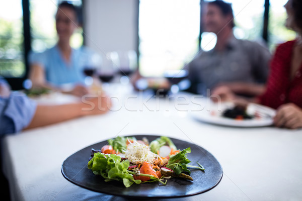 Tányér saláta étterem asztal emberek férfi Stock fotó © wavebreak_media