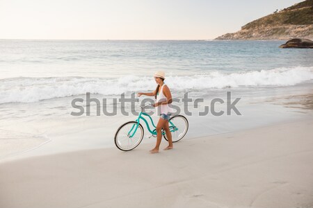 気楽な 女性 自転車 水 幸せ 海 ストックフォト © wavebreak_media