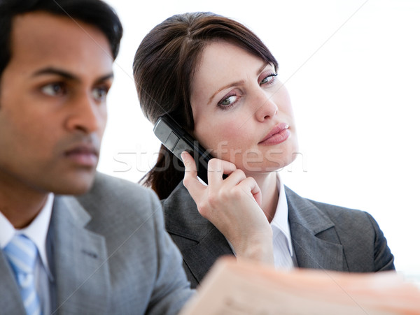 Beautiful businesswoman on phone in a waiting room Stock photo © wavebreak_media