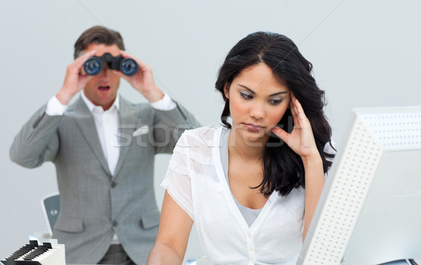 Young businesswoman getting bored and her manager looking throug Stock photo © wavebreak_media