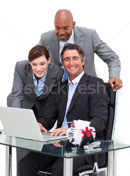 Alegre equipe de negócios trabalhando computador alegre branco Foto stock © wavebreak_media