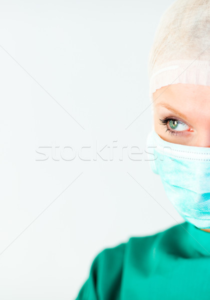 Brillante femenino cirujano máscara cara médico Foto stock © wavebreak_media
