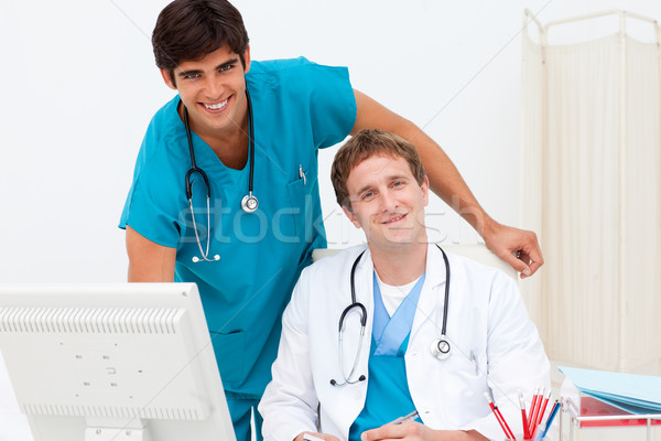 Portrait of a doctor and a medical intern working together Stock photo © wavebreak_media