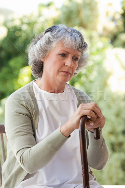Nyugdíjas nő sétál bot otthon mobil Stock fotó © wavebreak_media