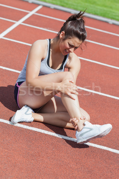 Female runner with ankle injury Stock photo © wavebreak_media