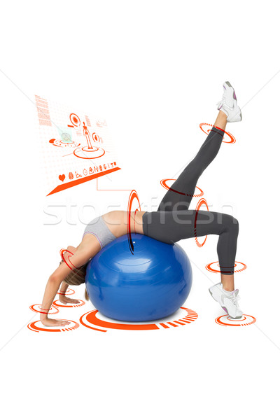 Stock photo: Composite image of fit young woman stretching on fitness ball