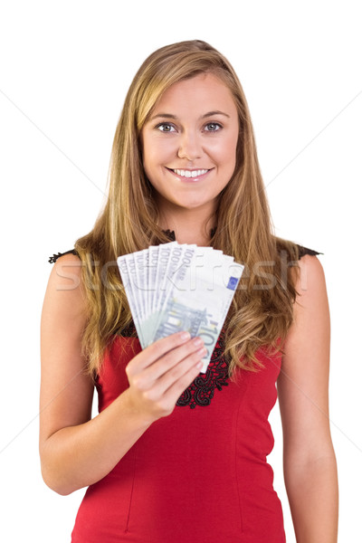 Pretty blonde showing wad of cash Stock photo © wavebreak_media