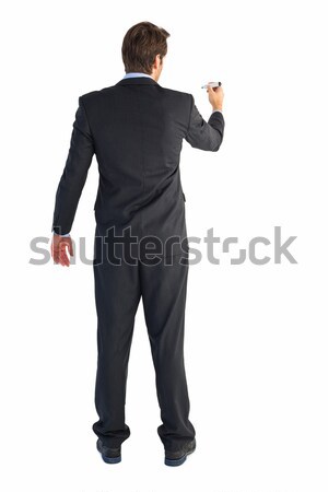 Businessman standing back to camera writing with marker Stock photo © wavebreak_media