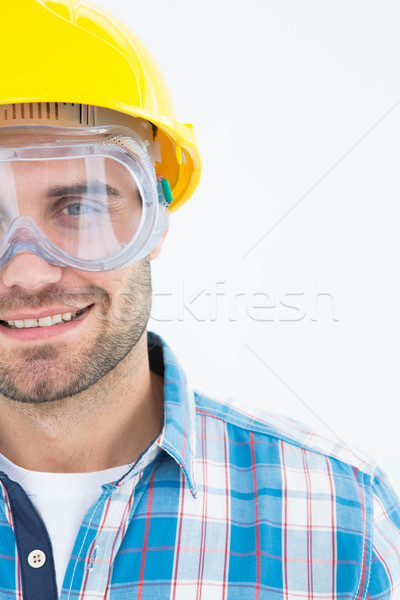 Repairman wearing protective glasses and hard hat Stock photo © wavebreak_media