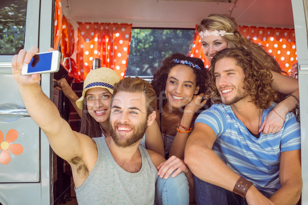 Stock photo: Hipster friends on road trip taking selfie