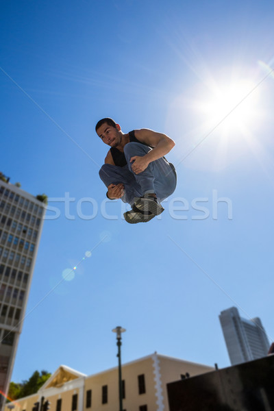  Man doing parkour in the city Stock photo © wavebreak_media