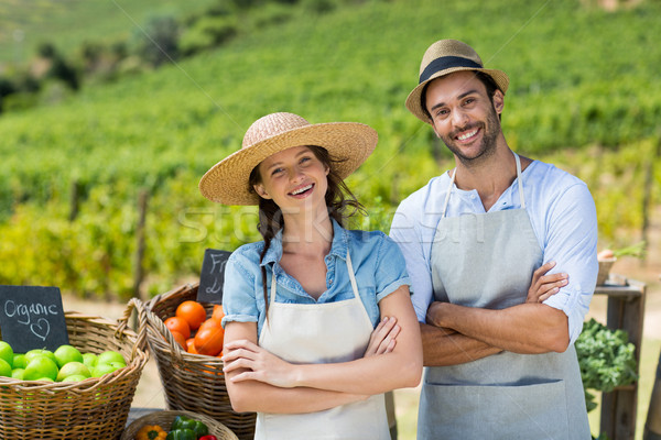 Portrait of happy couple with arms crossed at farm Stock photo © wavebreak_media