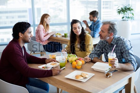 Friends placing order to waitress Stock photo © wavebreak_media