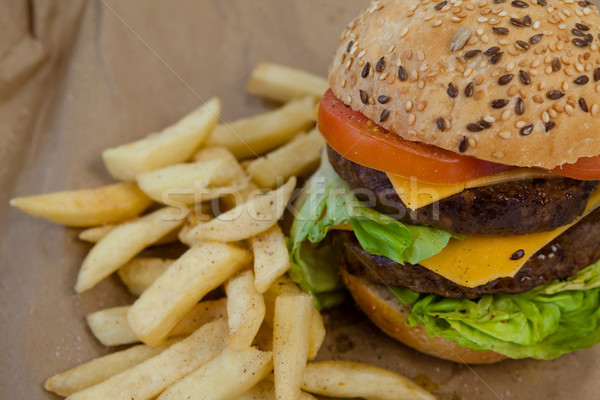 Stock fotó: Hamburger · sültkrumpli · papír · közelkép · étel · kenyér