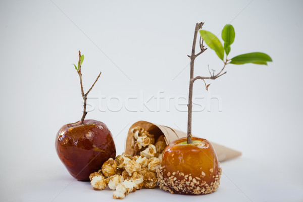 Primer plano decorado manzana palomitas blanco madera Foto stock © wavebreak_media