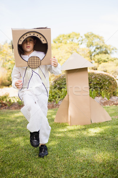 Adorable boy pretending to be astronaut Stock photo © wavebreak_media