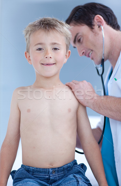 Sonriendo nino estetoscopio médico médicos hombres Foto stock © wavebreak_media