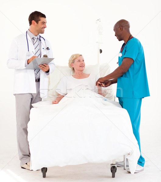 Surgeon greeting his patient in hospital  Stock photo © wavebreak_media