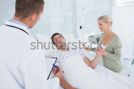Verpleegkundige bloeddruk patiënt familie hand Stockfoto © wavebreak_media