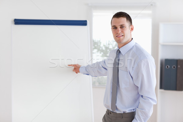 Confident young businessman giving a presentation Stock photo © wavebreak_media