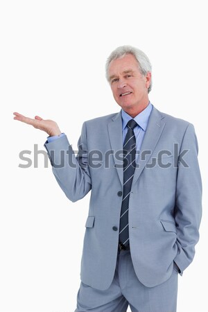 Shocked mature tradesman against a white background Stock photo © wavebreak_media