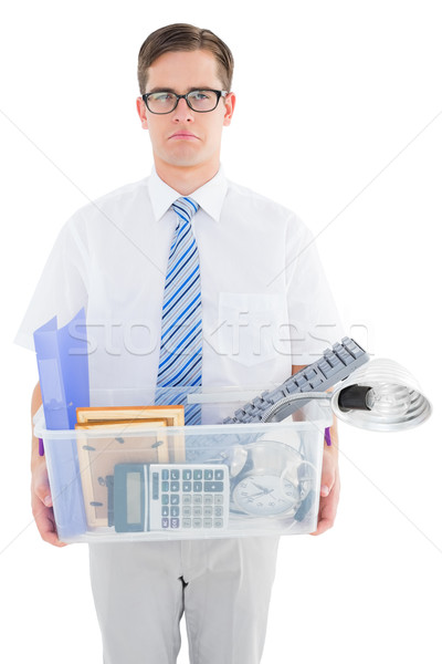 Fired businessman holding box of belongings Stock photo © wavebreak_media