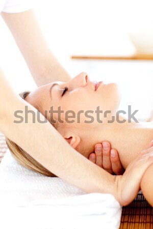 Attractive woman receiving head massage at spa center Stock photo © wavebreak_media
