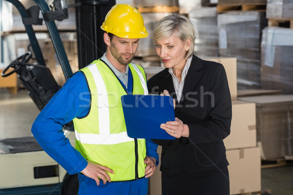 Forklift driver talking with his manager Stock photo © wavebreak_media