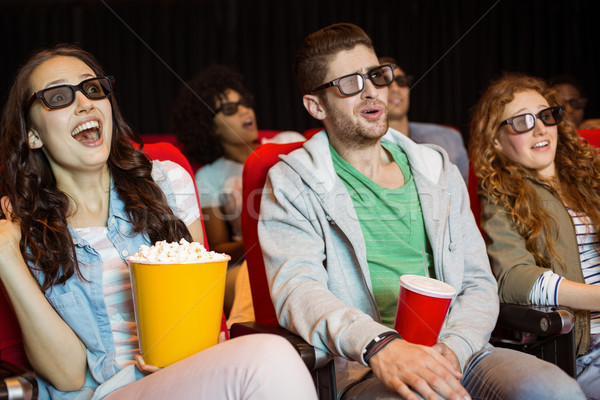 Young friends watching a 3d film Stock photo © wavebreak_media