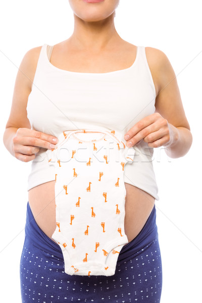 Stock fotó: Terhes · nő · tart · baba · ruházat · fehér · egészség
