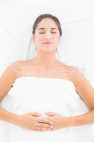 A beutiful young pretty woman with hands on her belly  Stock photo © wavebreak_media