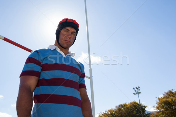 Portrait of rugby player wearing helmet against blue sky Stock photo © wavebreak_media