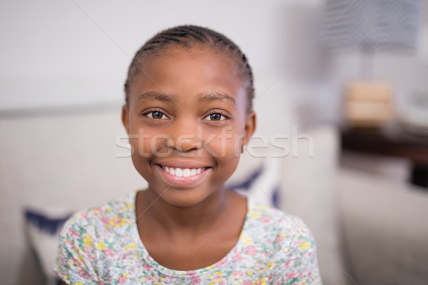 Portrait of smiling girl at home Stock photo © wavebreak_media