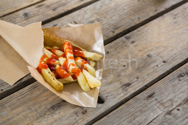 High angle view of French fries with sauce Stock photo © wavebreak_media