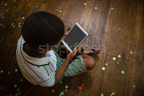 Jongen vergadering digitale tablet home Stockfoto © wavebreak_media