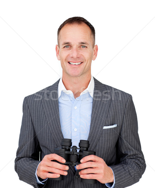 Happy businessman holding binoculars  Stock photo © wavebreak_media