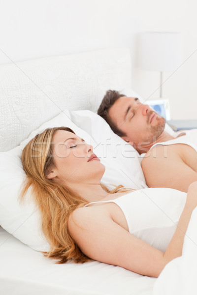Happy pair in their bed in their bedroom Stock photo © wavebreak_media