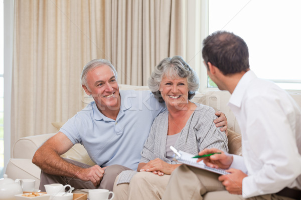Seniors with assurance man at home Stock photo © wavebreak_media