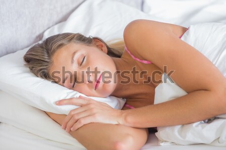 Close-up of an attractive red-haired woman sleeping in her bed Stock photo © wavebreak_media