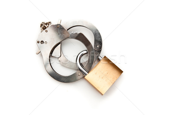 Manacle with lock against white background  Stock photo © wavebreak_media