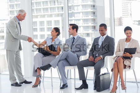 Ludzi biznesu posiedzenia poczekalnia duży Windows biuro Zdjęcia stock © wavebreak_media