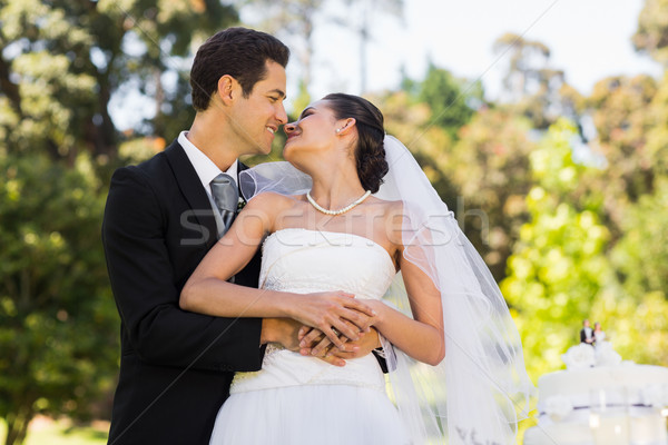 Friss házas csók esküvői torta park boldog fiatal Stock fotó © wavebreak_media