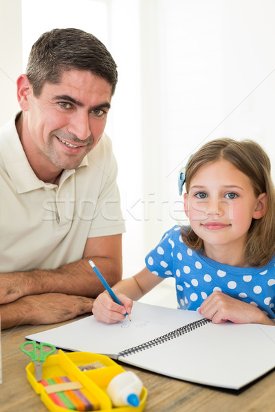 Father and daughter coloring Stock photo © wavebreak_media