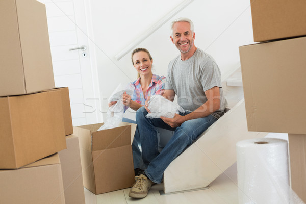 Boldog pár karton költözködő dobozok új otthon nő Stock fotó © wavebreak_media