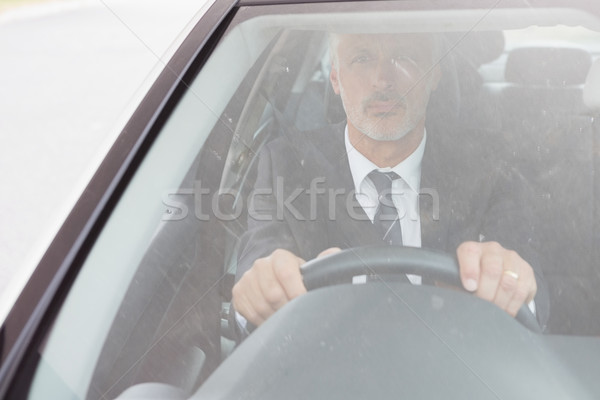 Homme séance roue voiture portrait [[stock_photo]] © wavebreak_media