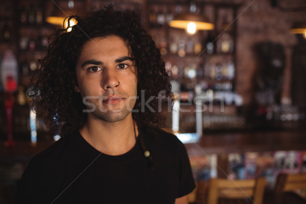 Portrait of man standing in pub Stock photo © wavebreak_media